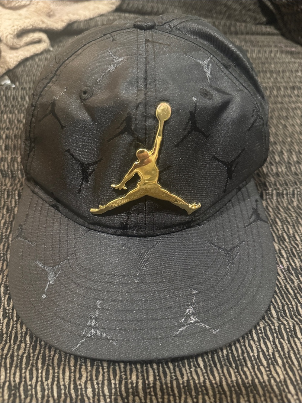 Jordan Black Snapback Hat with Gold Jumpman Accents